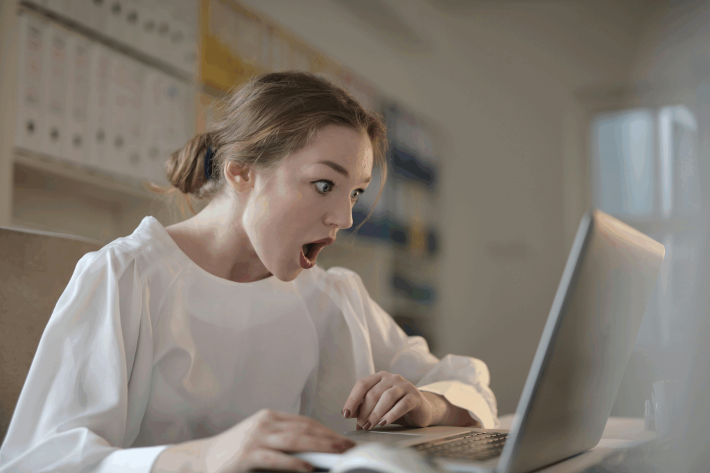 A person reading a negative performance review and responding to negative feedback at work for career growth